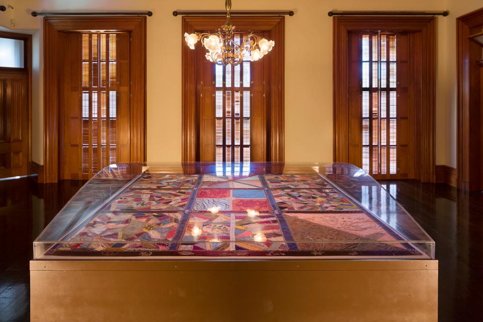 The Quilt Room currently displays a quilt the Queen made while under house arrest in her upstairs bedroom.