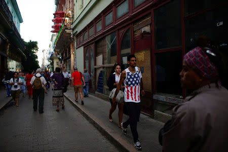 A man wearing the U.S. colours walks in downtown Havana, Cuba, January 12, 2017. REUTERS/Alexandre Meneghini