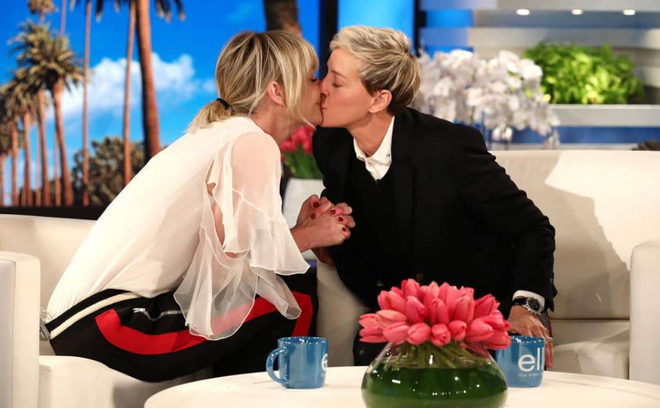 Portia De Rossi and Ellen DeGeneres kiss during The Ellen Show. Source: Michael Rozman/Warner Bros.