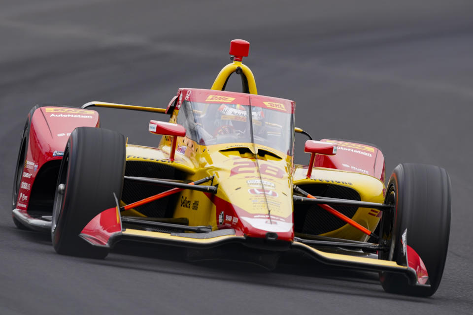 Ryan Hunter-Reay drives through the first turn during qualifications for the Indianapolis 500 auto race at Indianapolis Motor Speedway in Indianapolis, Saturday, May 22, 2021. (AP Photo/Michael Conroy)