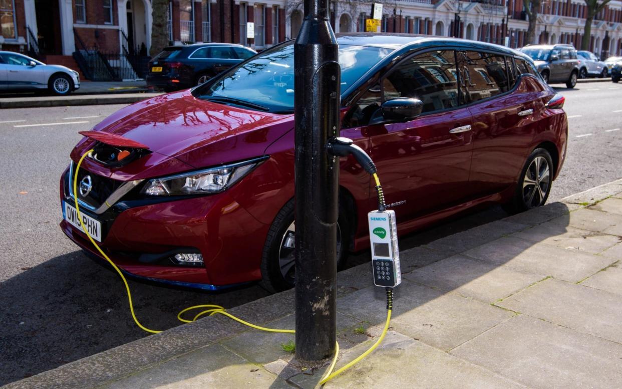 electric Nissan Leaf being charged on Sutherland Avenue, London - Anthony Upton/PA