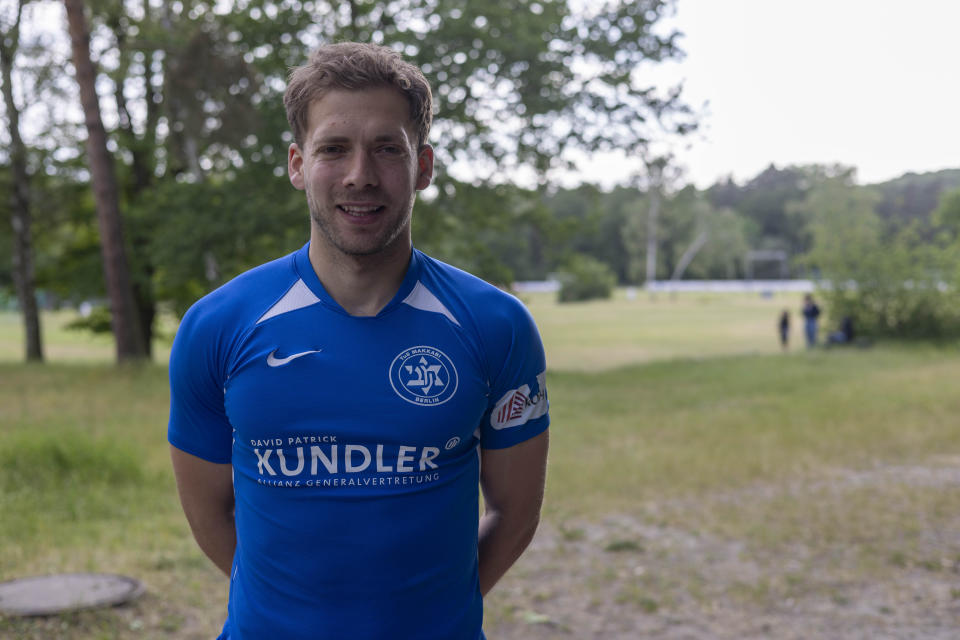 Makkabi Berlin captain Doron Bruck poses for a photo before an interview with The Associated Press in Berlin, Germany, Friday, May 17, 2024. Makkabi last year became the first Jewish club to play in the German Cup and it's bidding to reach the competition again on Saturday, May 25, when it plays Victoria Berlin in the Berlin Cup final. (AP Photo/Ciaran Fahey)