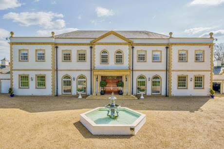 6-bedroom south coast estate that features a striking gold, white and black exterior - £9,000,000