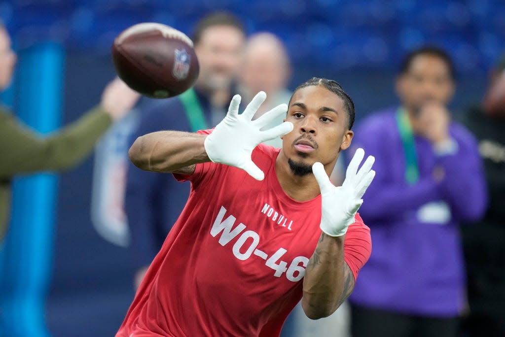 Tennessee Volunteers wide receiver Cedric Tillman runs a drill at the NFL scouting combine in Indianapolis, Saturday, March 4, 2023.