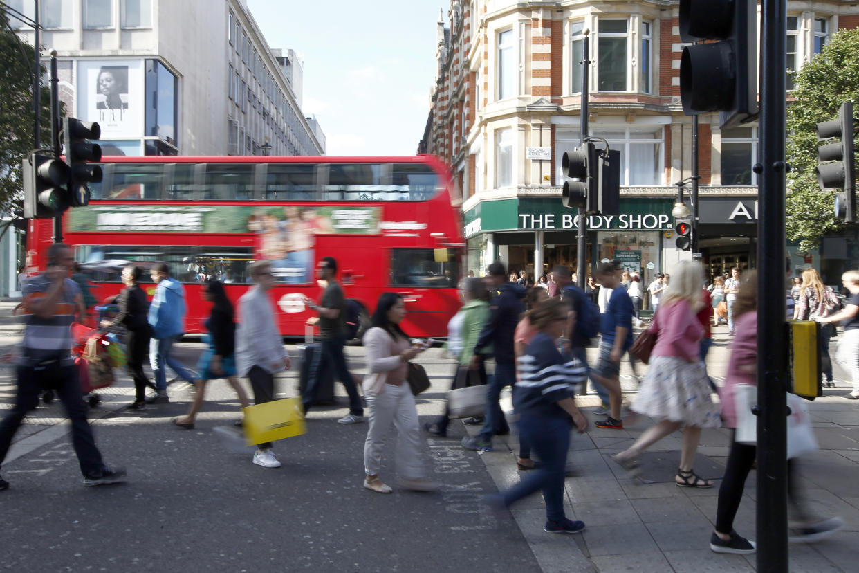 Retail sales Shoppers cross the road in Oxford Street, in London, Britain August 14, 2016. Photograph taken on August 14, 2016.   REUTERS/Peter Nicholls