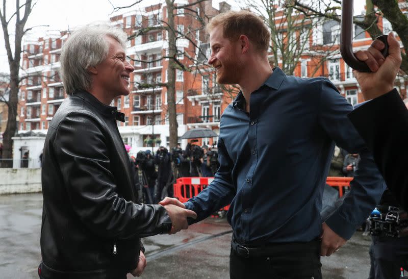 Britain's Prince Harry meets Jon Bon Jovi outside Abbey Road Studios in London