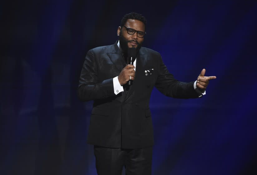 Host Anthony Anderson speaks on stage at the 51st NAACP Image Awards at the Pasadena Civic Auditorium on Saturday, Feb. 22, 2020, in Pasadena, Calif. (AP Photo/Chris Pizzello)