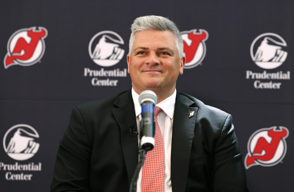 New Jersey Devils new NHL hockey team head coach Sheldon Keefe smiles during press conference, Tuesday, May 28, 2024, in Newark, N.J. (AP Photo/Noah K. Murray)