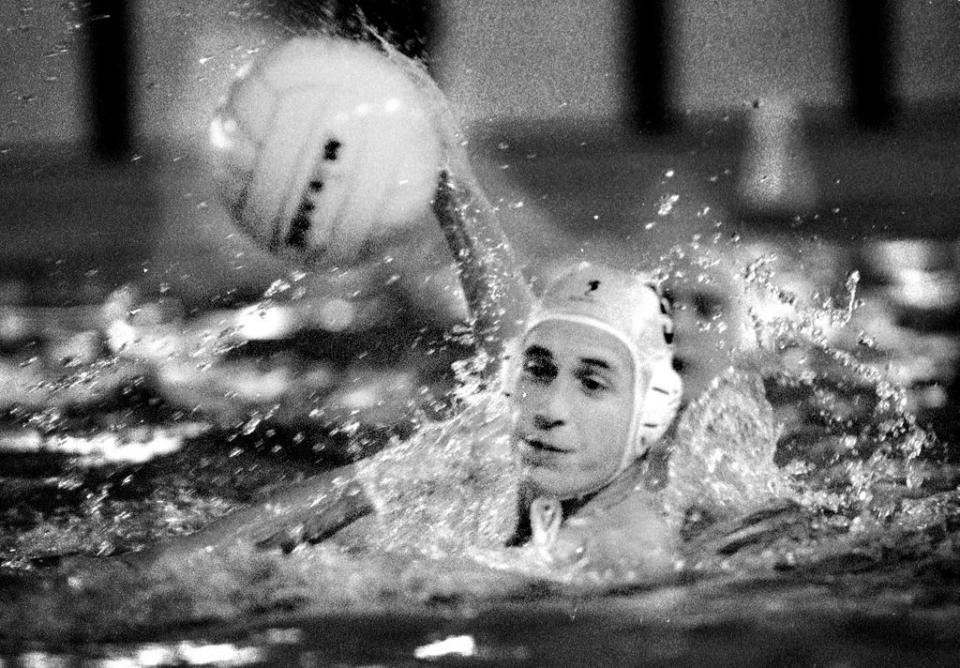 Black and white photo of Prince William playing water polo 