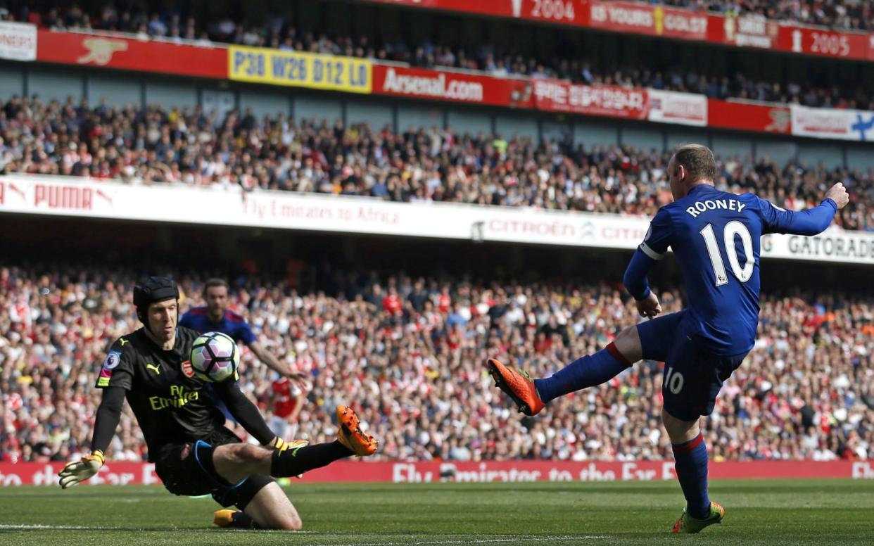 Arsenal's Petr Cech saving a shot by Manchester United's Wayne Rooney on 7 May 2017 - AFP