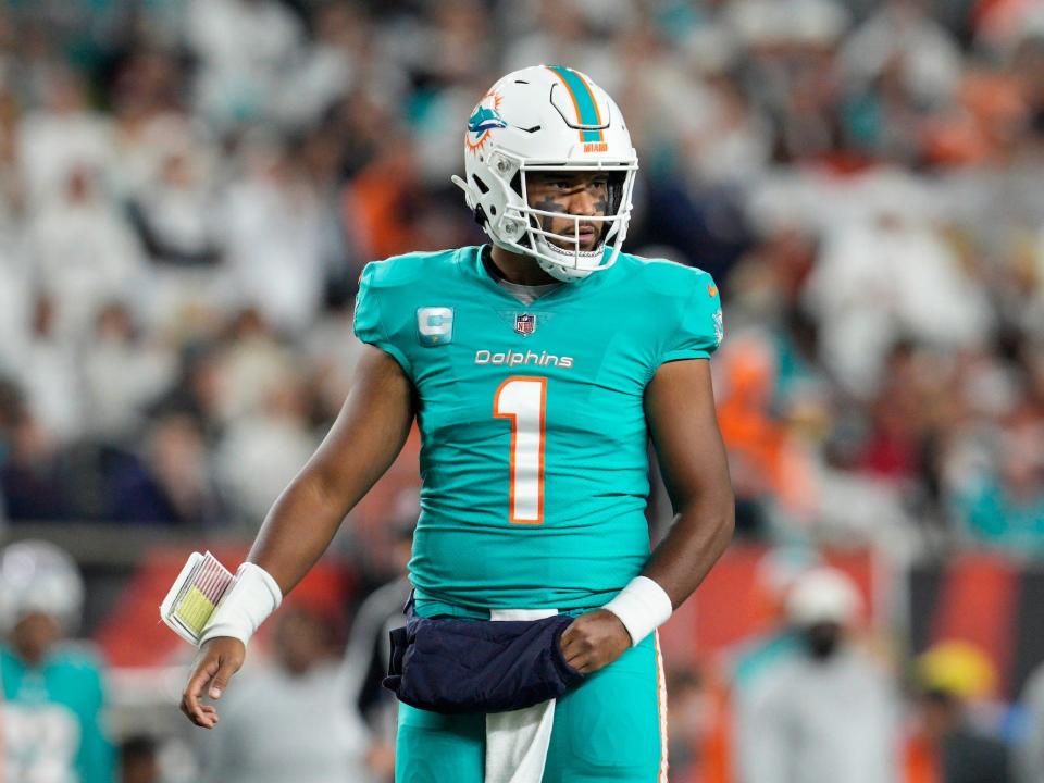 Tua Tagovailoa looks on during a Dolphins game.