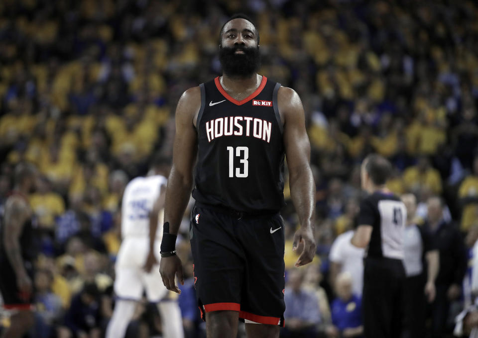 Houston Rockets' James Harden (13) walks downcourt during the first half of Game 5 of the team's second-round NBA basketball playoff series against the Golden State Warriors on Wednesday, May 8, 2019, in Oakland, Calif. (AP Photo/Ben Margot)