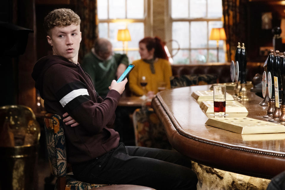 FROM ITV

STRICT EMBARGO
Print media - No Use Before Tuesday 19th April 2022
Online Media - No Use Before 0700hrs Tuesday 19th April 2022

Emmerdale - Ep 934950

Thursday 28th April 2022

Whilst Chloeâ€™s [JESSE ELLEAND] distracted in the pub Noah Tate [JACK DOWNHAM] seizes his opportunity to steal Chloeâ€™s phone - what is he up to?

Picture contact - David.crook@itv.com

Photographer - Mark Bruce

This photograph is (C) ITV Plc and can only be reproduced for editorial purposes directly in connection with the programme or event mentioned above, or ITV plc. Once made available by ITV plc Picture Desk, this photograph can be reproduced once only up until the transmission [TX] date and no reproduction fee will be charged. Any subsequent usage may incur a fee. This photograph must not be manipulated [excluding basic cropping] in a manner which alters the visual appearance of the person photographed deemed detrimental or inappropriate by ITV plc Picture Desk. This photograph must not be syndicated to any other company, publication or website, or permanently archived, without the express written permission of ITV Picture Desk. Full Terms and conditions are available on  www.itv.com/presscentre/itvpictures/terms