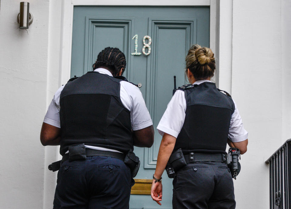 LONDON, ENGLAND - MAY 24: Two police officers arrive at the home of Dominic Cummings, Chief Advisor to Prime Minister Boris Johnson, on May 24, 2020 in London, England. On March 31st 2020 Downing Street confirmed to journalists that Dominic Cummings was self-isolating with COVID-19 symptoms at his home in North London. Durham police have confirmed that he was actually hundreds of miles away at his parent's house in the city. (Photo by Peter Summers/Getty Images)