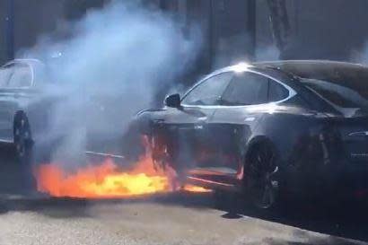 Car blaze: the Tesla after the fire broke out: Twitter/@marycmccormack