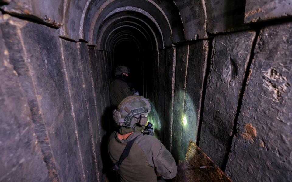 Israeli soldiers in a tunnel underneath Al Shifa Hospital in Gaza City