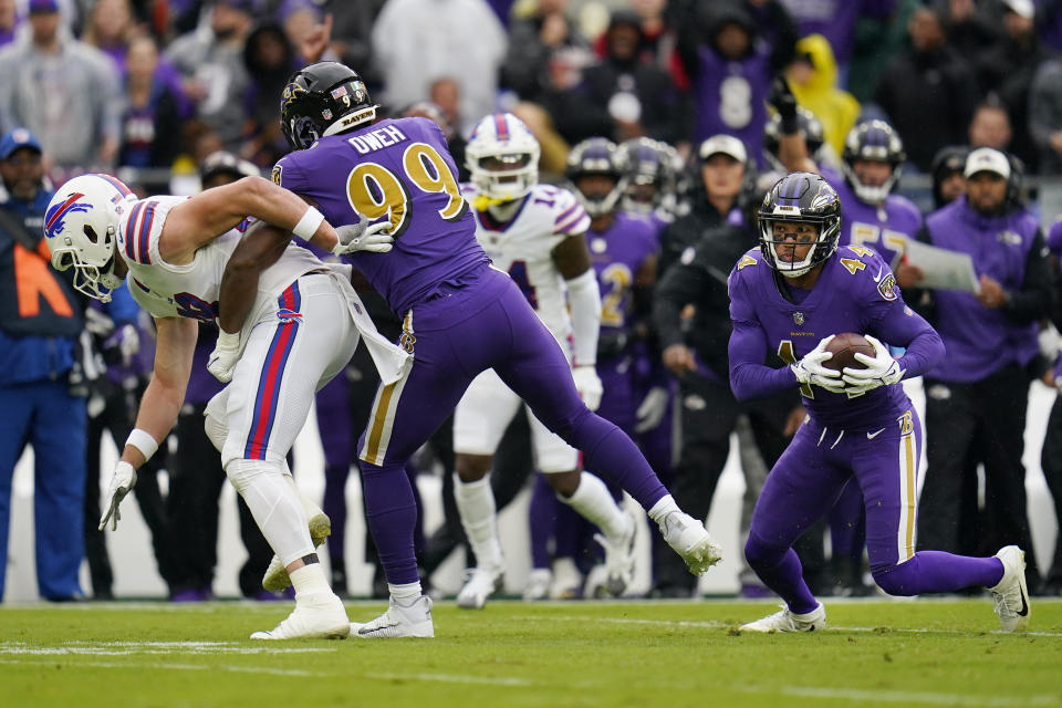 Baltimore Ravens cornerback Marlon Humphrey (44) intercepts a pass against the Buffalo Bills in the first half of an NFL football game Sunday, Oct. 2, 2022, in Baltimore. (AP Photo/Julio Cortez)