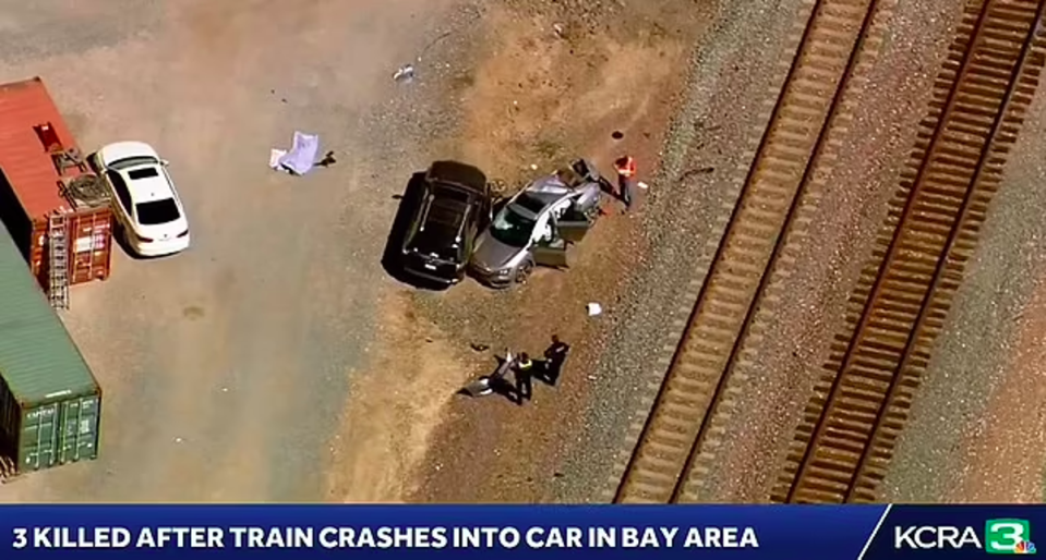 An Amtrak passenger train crashed into a four-door sedan at a crossing without a train signal or guardrails in Northern California on Sunday, killing three people and critically injuring two others including a child (KCRA Sacramento/video screengrab)