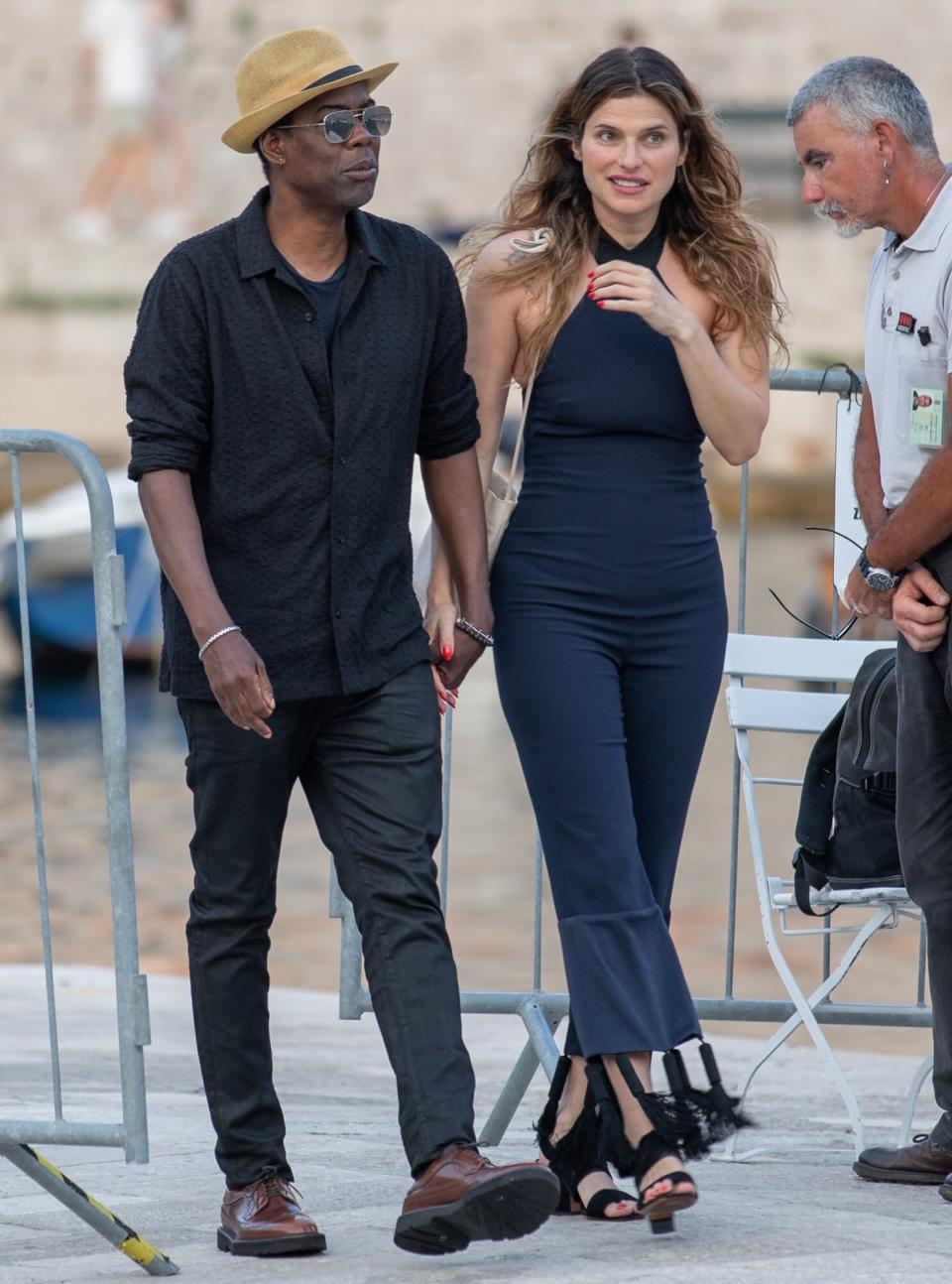 Chris Rock decided to take a walk around town with his new girlfriend, actress Lake Bell