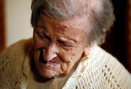 Emma Morano, thought to be the world's oldest person and the last to be born in the 1800s, is seen during her 117th birthday in Verbania, northern Italy November 29, 2016. REUTERS/Alessandro Garofalo