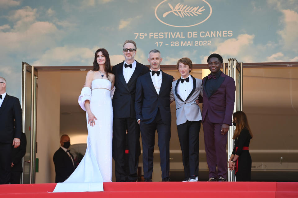 From left, Anne Hathaway, director James Gray, Jeremy Strong, Banks Repeta and Jaylin Webb at an Armageddon Time screening in Cannes. - Credit: Getty Images