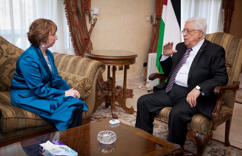 This photograph released by the Delegation of European Union in Egypt shows European Union foreign policy chief Catherine Ashton, left, meeting with Palestinian President Mahmoud Abbas in Cairo, Egypt, Thursday, April 10, 2014.(AP Photo/Pedro Luis Costa Gomes)