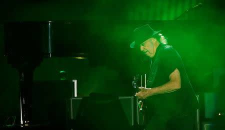 FILE PHOTO: Musician Neil Young performs at Desert Trip music festival at Empire Polo Club in Indio, California U.S., October 8, 2016. REUTERS/Mario Anzuoni