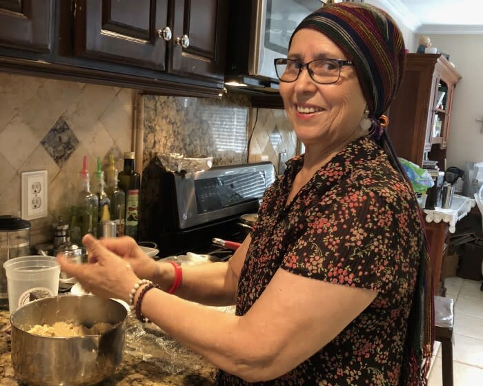 Maria de la Luz Arellano, making gorditas at her home in Anaheim in 2018