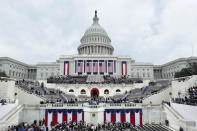 <p>Spectators begin to fill seats for the inauguration on the West Front of the U.S. Capitol on January 20, 2017 in Washington. (Photo: Alex Wong/Getty Images) </p>