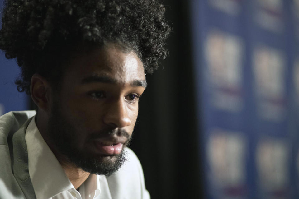 Coby White, a freshman basketball player from North Carolina, attends the NBA Draft media availability, Wednesday, June 19, 2019, in New York. The draft will be held Thursday, June 20. (AP Photo/Mark Lennihan)