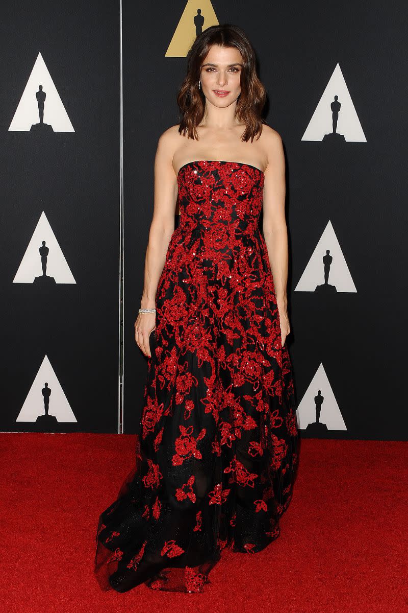 Her embellished red and black gown