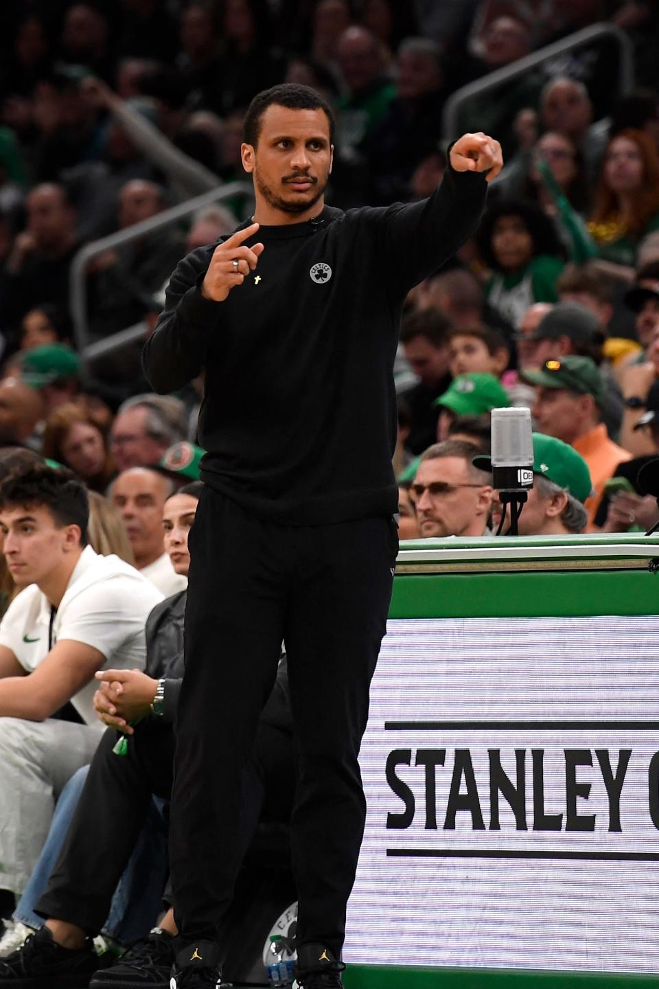 Boston Celtics head coach Joe Mazzulla gives instruction to his players during the second half of Sunday's game.