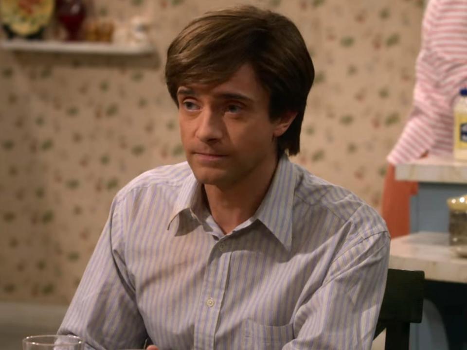 Topher Grace as Eric Forman on season one, episode one of "That '90s Show."