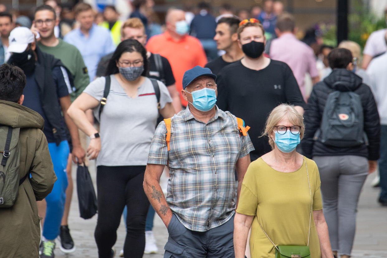 People wearing face masks among crowds of pedestrians in Covent Garden, London. Rumours were abound in the Sunday newspapers that Prime Minister Boris Johnson, who is due to update the nation this week on plans for unlocking, is due to scrap social distancing and mask-wearing requirements on so-called 