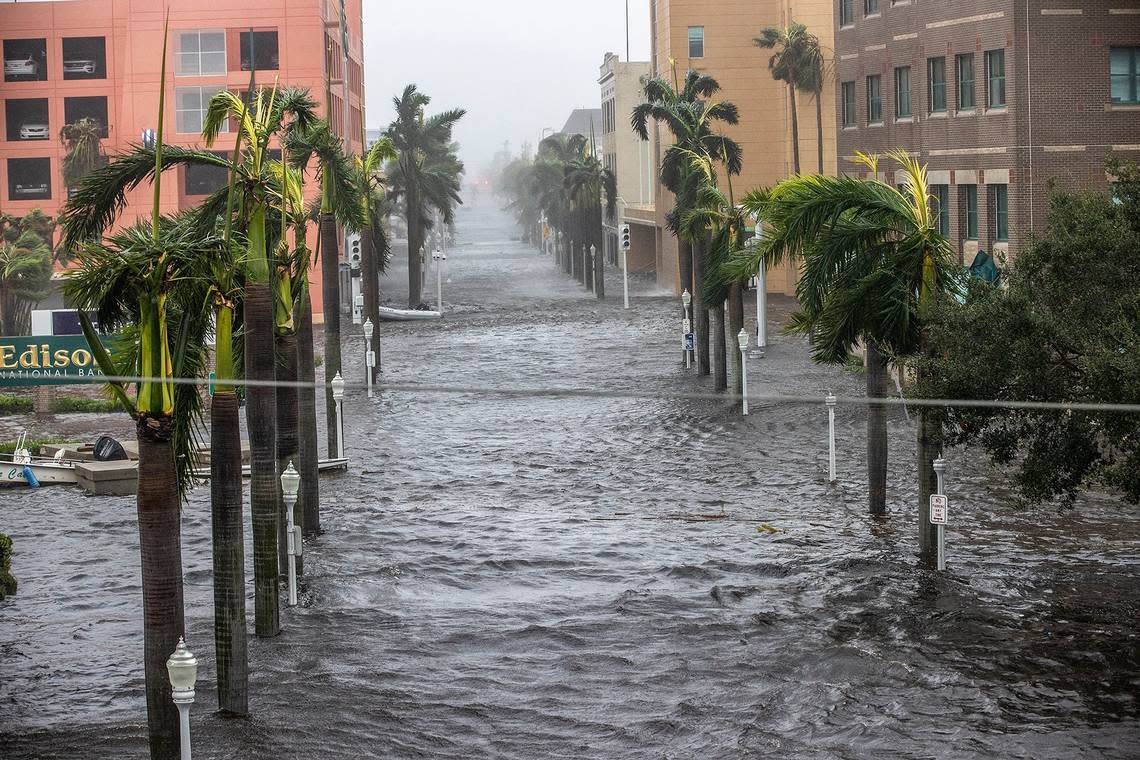 Streets of downtown in Fort Myers get flooded due to the surge of the Caloosahatchee River as Hurricane Ian hits the West Coast of Florida as Category 4 storm, on Wednesday, Sept. 28, 2022