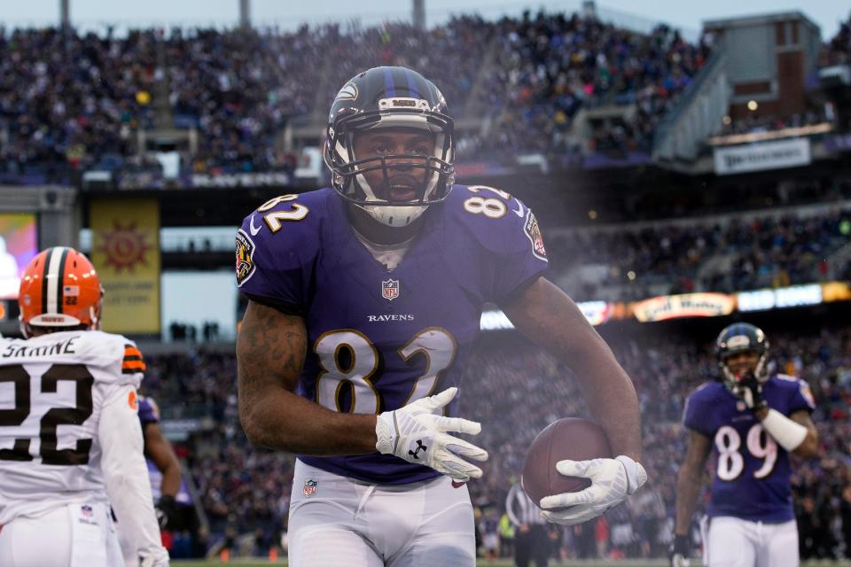 Former Baltimore Ravens wide receiver Torrey Smith (82) celebrates after scoring a touchdown during the fourth quarter against the Cleveland Browns at M&T Bank Stadium. He now helps children and families in the Baltimore community through sports.