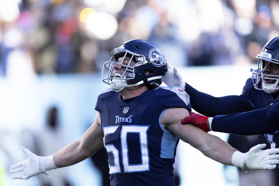 Tennessee Titans linebacker Jack Gibbens (50) celebrates after making an interception against the Houston Texans during an NFL football game Saturday, Dec. 24, 2022, in Nashville, Tenn. (AP Photo/Wade Payne)