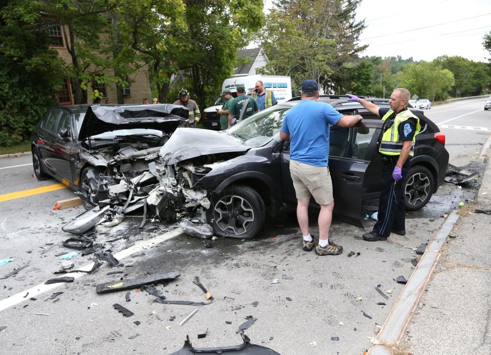 South Berwick firefighters and police respond to a crash on Main Street just beyond the Rollinsford town line Tuesday, Sept. 13, 2022.