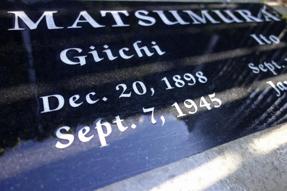 FILE - This Oct. 22, 2019 file photo photo shows a gravestone in Woodlawn Cemetery in Santa Monica, Calif., that commemorates the death of Giichi Matsumura, who died in the Sierra Nevada on a fishing trip while he was at the Japanese internment camp at Manzanar. A skeleton found by hikers this fall near California's second-highest peak was identified Friday, Jan. 3, 2020, as Matsumura, a Japanese American artist who had left the Manzanar internment camp to paint in the mountains in the waning days of World War II. (AP Photo/Brian Melley, File)