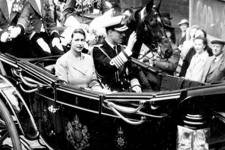 <p>United Press Photo/SuperStock/Alamy Stock Photo</p> Queen Elizabeth and Prince Philip travel by carriage for their special visit to Scotland on June 24, 1953.