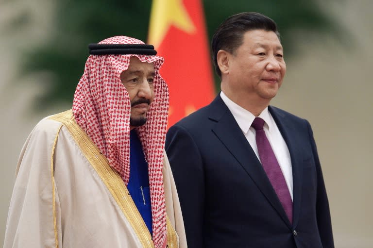 Chinese President Xi Jinping (right) welcomed Saudi King Salman bin Abdulaziz at the Great Hall of the People as Beijing continues a charm offensive toward the Middle East