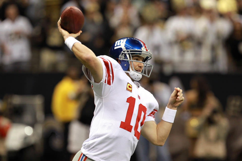 NEW ORLEANS, LA - NOVEMBER 28: Quarterback Eli Manning #10 of the New York Giants passes the ball against the New Orleans Saints in the second quarter at Mercedes-Benz Superdome on November 28, 2011 in New Orleans, Louisiana. (Photo by Ronald Martinez/Getty Images)