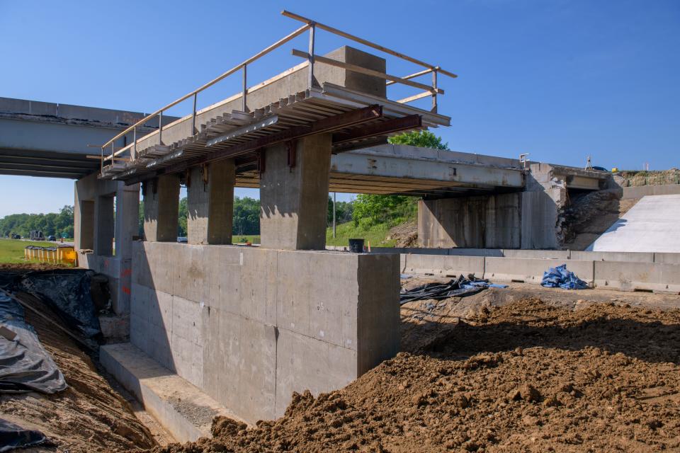 The center pier of the northbound lanes of the Airport Road overpass at Interstate 474, currently under reconstruction, sits on naturally-formed base of underground rock.