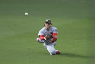 St. Louis Cardinals center fielder Harrison Bader can't make the catch on a single hit by San Diego Padres' Austin Nola during the fourth inning of a baseball game Sunday, May 16, 2021, in San Diego. (AP Photo/Denis Poroy)