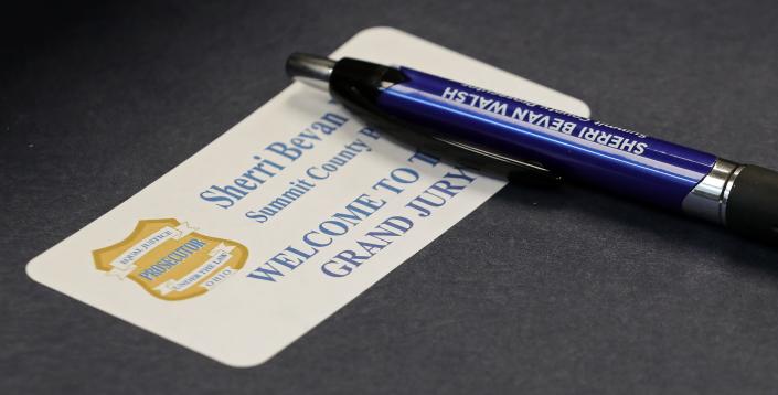 Folders mark the spots of jurors in the grand jury room at the Summit County Courthouse, Tuesday, March 28, 2023, in Akron, Ohio.