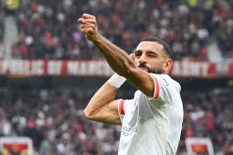 MANCHESTER, ENGLAND - SEPTEMBER 01: Mohamed Salah of Liverpool celebrates scoring his team's third goal during the Premier League match between Manchester United FC and Liverpool FC at Old Trafford on September 01, 2024 in Manchester, England. (Photo by Michael Regan/Getty Images) -Credit:Getty Images