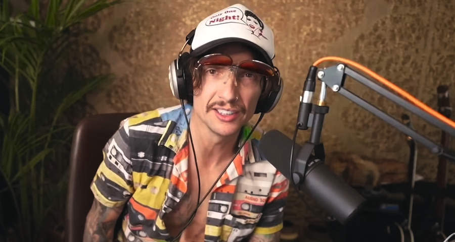 Justin Hawkins wearing a pair of headphones