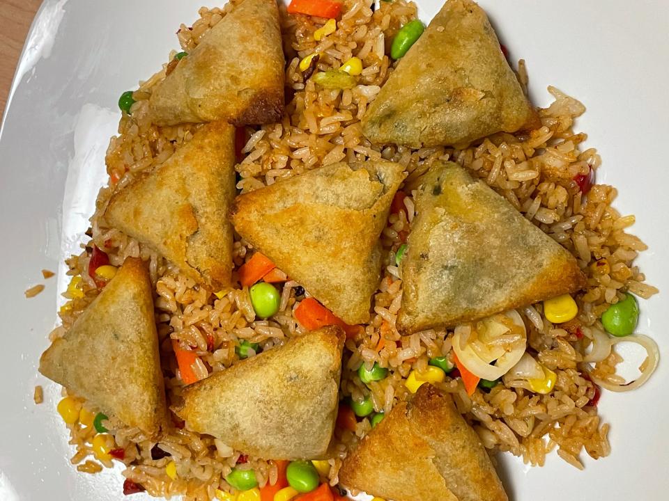 prepared trader joe's veggie samosas over fried rice