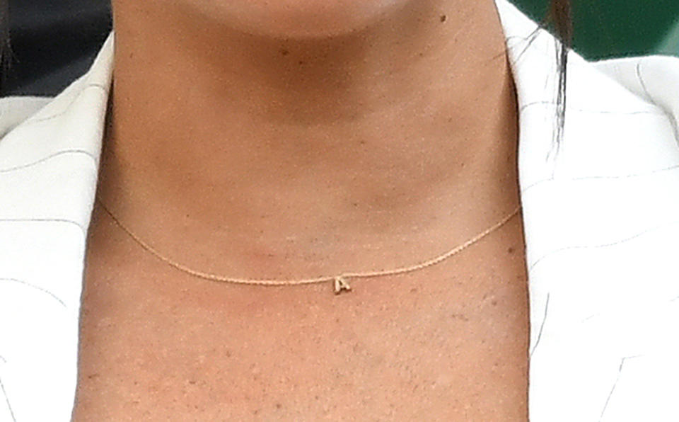 A close-up view of the Duchess of Sussex's sentimental necklace [Photo: Getty]