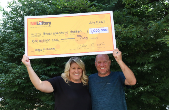 While there was no jackpot winner in the latest Mega Millions drawing, Cheryl Vossen of Colorado Springs, Colorado, with her husband, Brian, claimed a $1 million Mega Millions prize on Thursday, July 21, 2022 after purchasing the winning ticket at the New Hampshire Liquor & Wine Outlet on the Portsmouth traffic circle. They are seen here at New Hampshire Lottery headquarters in Concord.